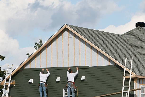Professional Emergency Siding Repair technician working in Worcester, PA